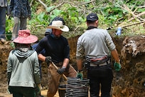 Rob Ingraham, a forensic archeologist for the Defense POW/MIA Accounting Agency (DPAA), excavates a unit during a recovery mission in Vietnam, April 11, 2025.