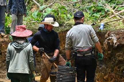 Rob Ingraham, a forensic archeologist for the Defense POW/MIA Accounting Agency (DPAA), excavates a unit during a recovery mission in Vietnam, April 11, 2025.
