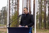 Matt Wall, Chargé d’affaires at the U.S. Embassy in Tallinn, gives a speech during a ceremony unveiling Estonia's newly received M142 High Mobility Artillery Rocket Systems (HIMARS) at Amari Air Base, Estonia, April 30, 2025. Originally approved for sale to Estonia in 2022 by the U.S. State Department, the HIMARS gives precise long-range artillery capabilities to enhance national security and regional stability. U.S. Soldiers, supporting Task Force Voit, have trained Estonian soldiers on operating the system prior to the delivery. (U.S. Army photo by Sgt. Austin Steinborn)
