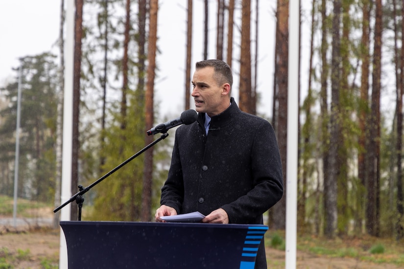 Matt Wall, Chargé d’affaires at the U.S. Embassy in Tallinn, gives a speech during a ceremony unveiling Estonia's newly received M142 High Mobility Artillery Rocket Systems (HIMARS) at Amari Air Base, Estonia, April 30, 2025. Originally approved for sale to Estonia in 2022 by the U.S. State Department, the HIMARS gives precise long-range artillery capabilities to enhance national security and regional stability. U.S. Soldiers, supporting Task Force Voit, have trained Estonian soldiers on operating the system prior to the delivery. (U.S. Army photo by Sgt. Austin Steinborn)