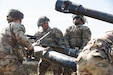 U.S. Soldiers assigned to 1st Battalion, 320th Field Artillery Regiment, 2nd Brigade Combat Team, 101st Airborne Division, set up the Howitzer M119A3 during their Table V certifications at Mihail Kogălniceanu Air Base, Romania, May 1, 2025. This training exercise serves as a way to improve standard operating procedures, which overall increases the warfighting capabilities of U.S. Soldiers allowing them to deploy, engage, and destroy enemies of the United States of America on any battlefield. (U.S. Army photo by Spc. Nathan Arellano Tlaczani)