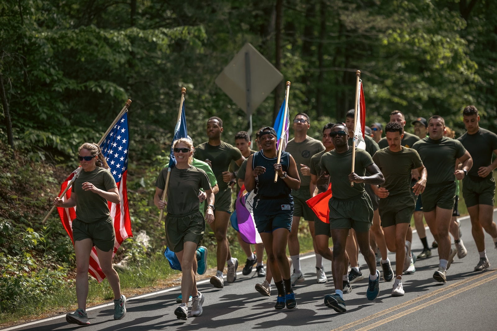 U.S. Marines and volunteers run during the Virginia Run for the Fallen event at Marine Corps Base Quantico, Virginia, May 3, 2024.  The Virginia Run for the Fallen is an organized tribute event to run specific miles for every Virginia Fallen Service Member who died as a result of serving from any circumstance during the War on Terror. (U.S. Marine Corps photo by Lance Cpl. Ethan Miller)