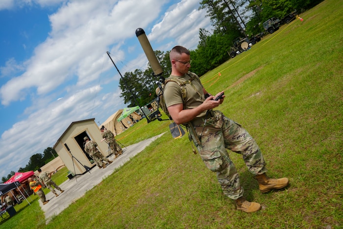 Tech. Sgt. Michael Kramer, with 85th Engineering Installation Squadron, does a perimeter scan with the Beast+, during the 2025 XCOMM Roundup at Robins Air Force Base, Georgia, April 28, 2025.
