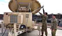 Army space professionals celebrate National Space Day on May 2 to recognize how they live and work every day. Spc. Klay Walker and Spc. Alexander Best with the 4th Space Company, 1st Space Battalion, work on a Mobile Integrated Ground Suite at Fort Carson, Colorado. The 1st Space Brigade recently conducted an expeditionary maneuver of transportable systems across combatant command areas of responsibility, demonstrating to allies and partners the readiness of the brigade and its subordinate units to deploy rapidly around the globe. (U.S. Army Photo by Dottie White)
