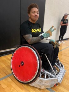 Capt. Channda Mitchell plays wheelchair rugby at adaptive sports camp at Fort Bragg, March 2025.