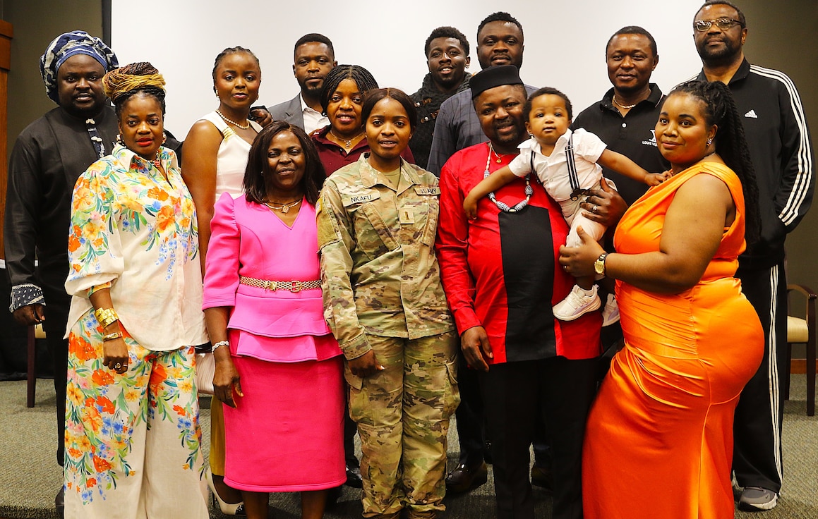 2nd Lt. Juliana Nkafu with her family and friends after her commissioning ceremony.