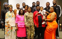 2nd Lt. Juliana Nkafu with her family and friends after her commissioning ceremony.
