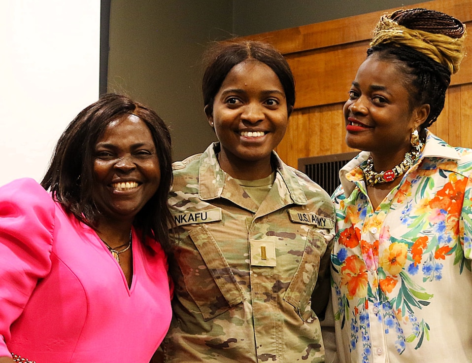 Anastasia Asong with her niece, 2nd Lt. Juliana Nkafu, and Euchinie Amindeh pose for a photo after her pinning.