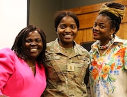 Anastasia Asong with her niece, 2nd Lt. Juliana Nkafu, and Euchinie Amindeh pose for a photo after her pinning.