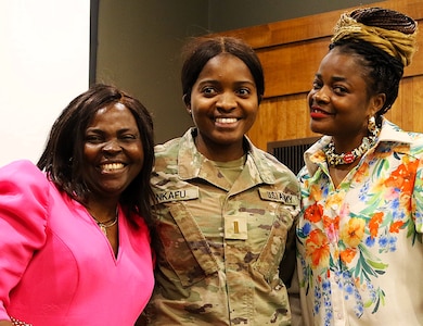 Anastasia Asong with her niece, 2nd Lt. Juliana Nkafu, and Euchinie Amindeh pose for a photo after her pinning.
