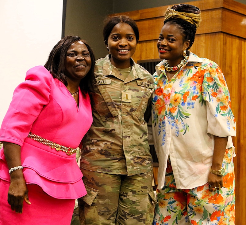 Anastasia Asong with her niece, 2nd Lt. Juliana Nkafu, and Euchinie Amindeh pose for a photo after her pinning.
