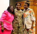 Anastasia Asong with her niece, 2nd Lt. Juliana Nkafu, and Euchinie Amindeh pose for a photo after her pinning.