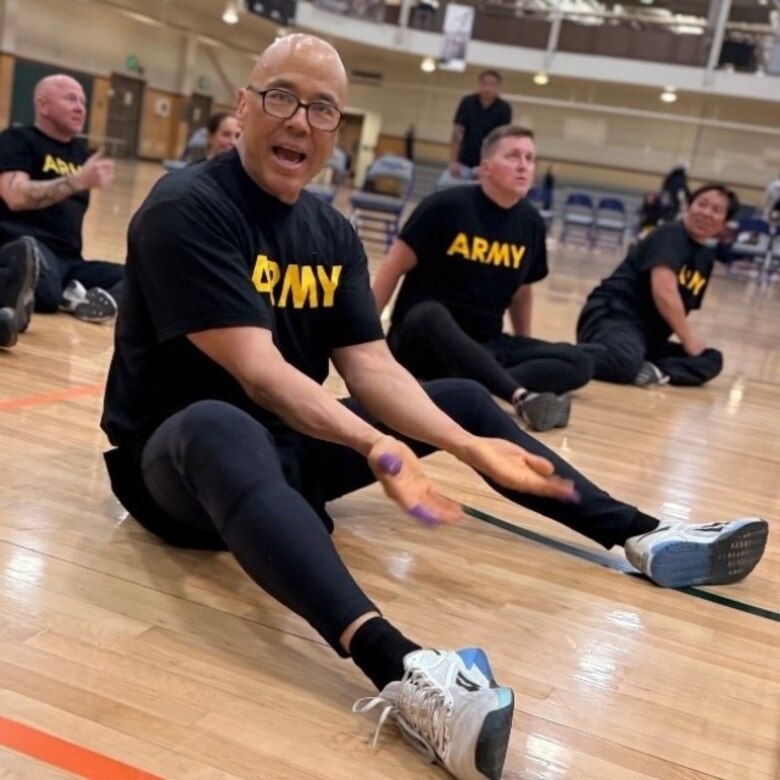 Sgt. 1st Class Hong gas some fun during sitting volleyball practice at the 2025 Army Trials on Fort Bliss, Texas.
