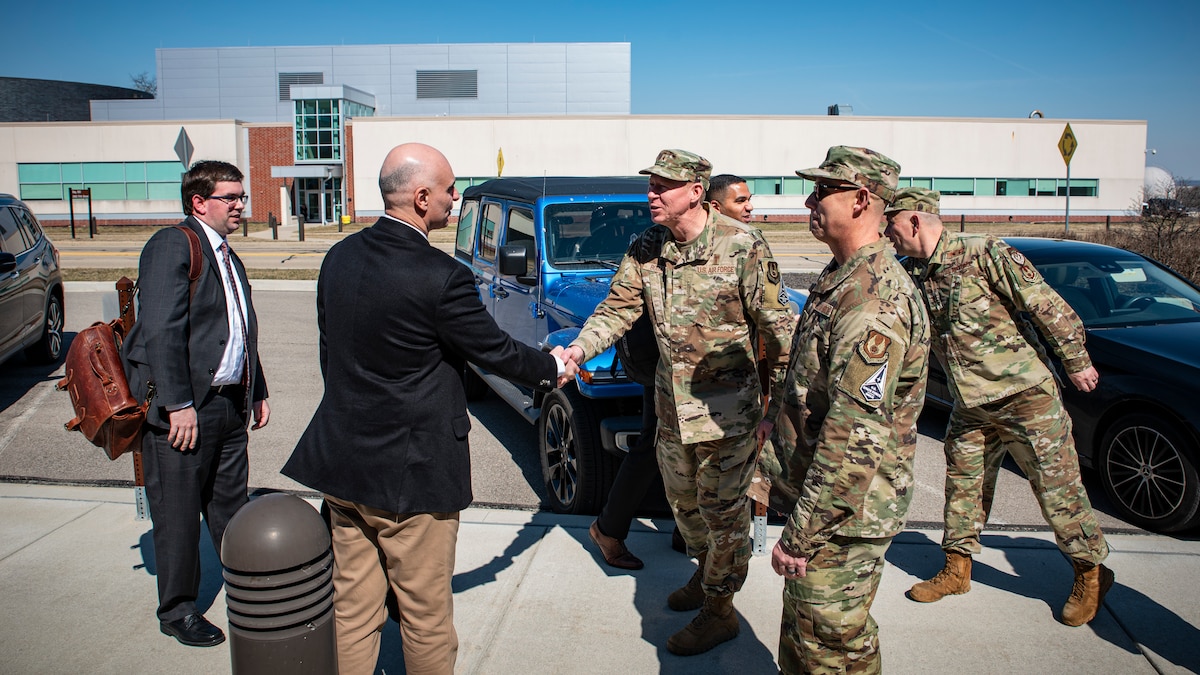 Leaders from the Air Force Research Laboratory’s 711th Human Performance Wing greet Purdue University leaders prior to a tour of several facilities at Wright-Patterson Air Force Base, Ohio, March 11, 2025. The U.S. Air Force School of Aerospace Medicine hosted Purdue leaders in honor of a new partnership that expands educational opportunities for Airmen and Guardians. (U.S. Air Force photo / Richard Eldridge)