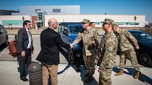 Leaders from the Air Force Research Laboratory’s 711th Human Performance Wing greet Purdue University leaders prior to a tour of several facilities at Wright-Patterson Air Force Base, Ohio, March 11, 2025. The U.S. Air Force School of Aerospace Medicine hosted Purdue leaders in honor of a new partnership that expands educational opportunities for Airmen and Guardians. (U.S. Air Force photo / Richard Eldridge)