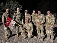 Soldiers from 1st Squadron, 303rd Cavalry Regiment pose with Col. Josh Barrow, commander, 96th Troop Command, following the 5th annual Central Washington University Army Reserve Officer Training Corp.