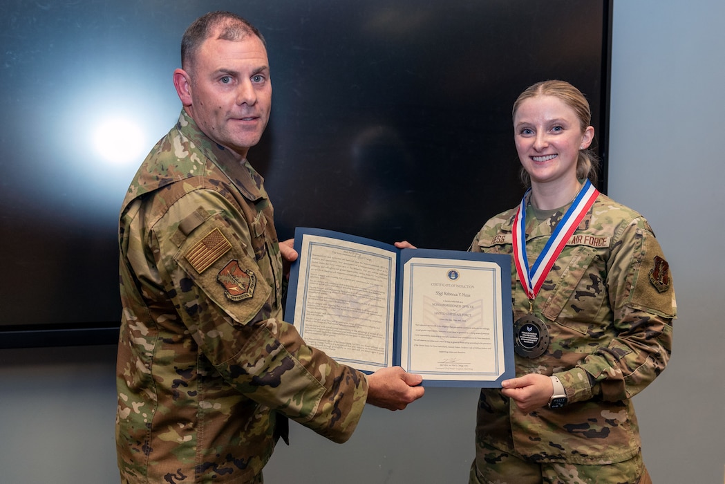 Airmen at induction ceremony.