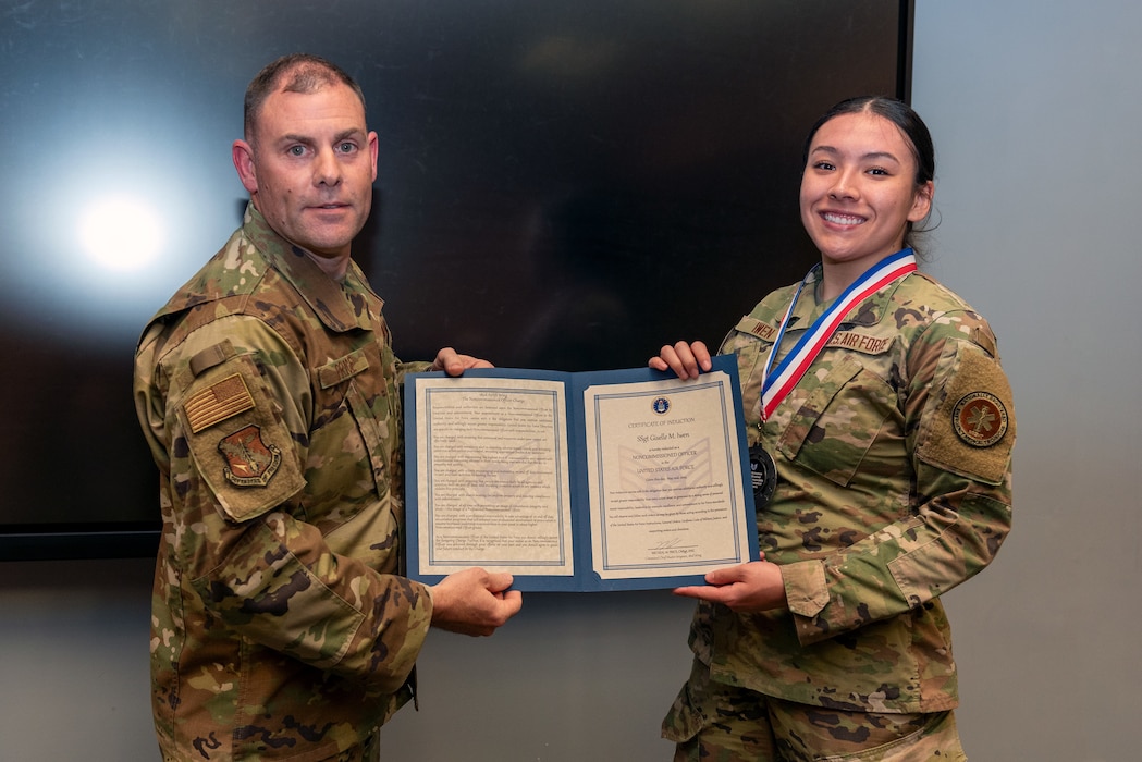 Airmen at induction ceremony.