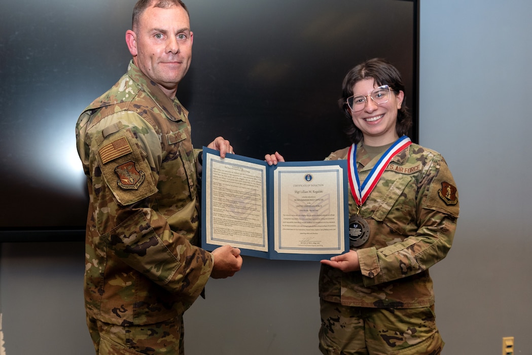 Airmen at induction ceremony.