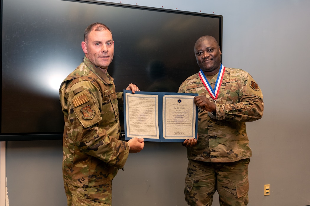 Airmen at induction ceremony.