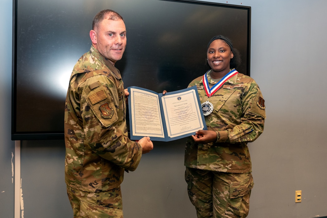 Airmen at induction ceremony.