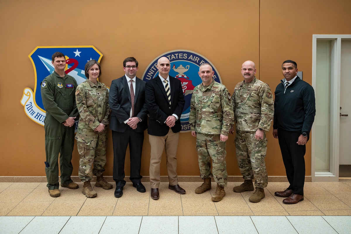 Leaders from the U.S. Air Force School of Aerospace Medicine, or USAFSAM, and Purdue University pose during a tour of several 711th Human Performance Wing facilities at Wright-Patterson Air Force Base, Ohio, March 11, 2025. USAFSAM hosted Purdue leaders in honor of a new partnership that expands educational opportunities for Airmen and Guardians. (U.S. Air Force photo / Richard Eldridge)