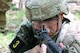 Sgt Truxton Brodhead pulling security while waiting further direction from his squad leader after navigating to their first land navigation point during the Best Warrior Competition on April 29.