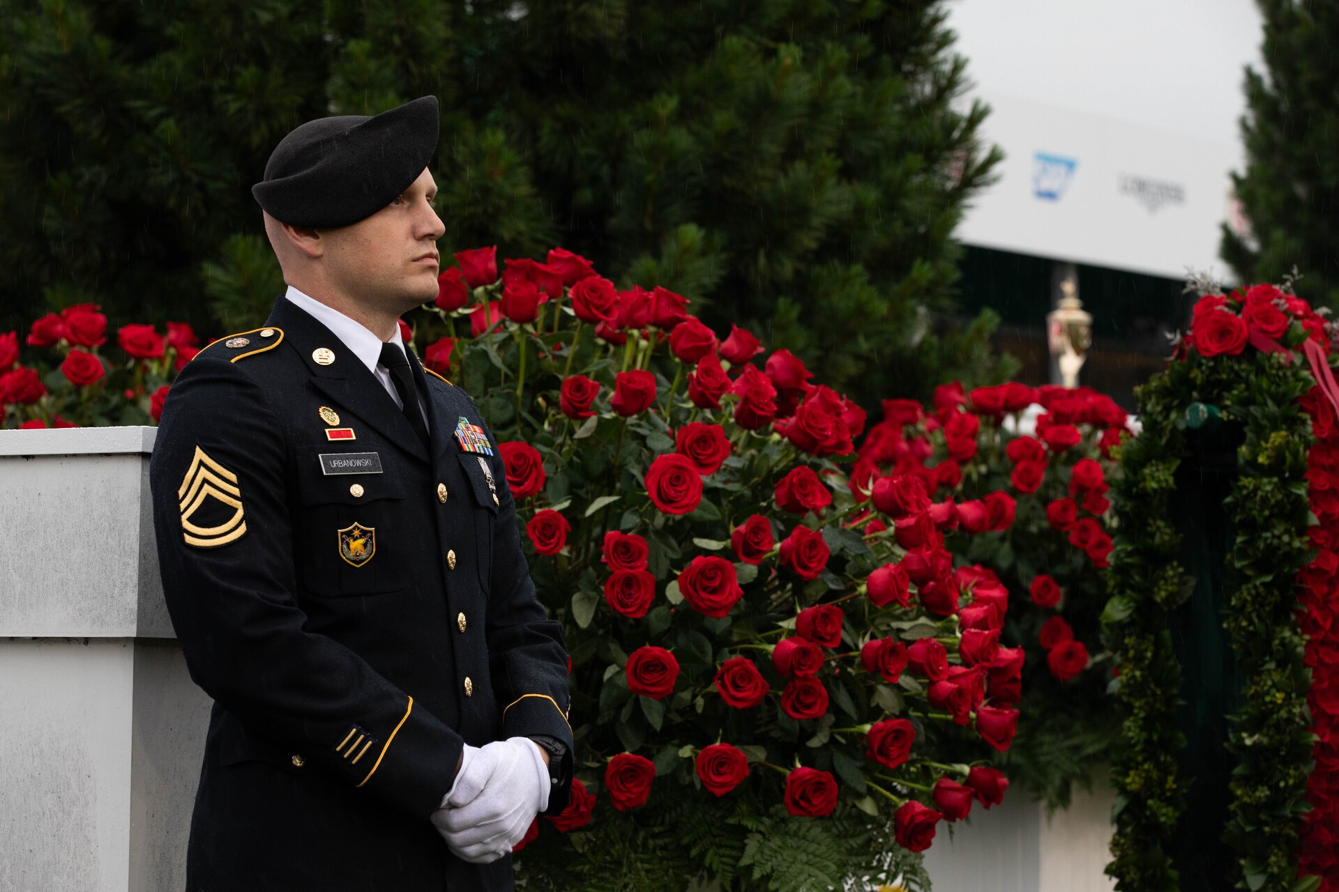 Sgt. 1st. Class Joshua Urbanowski of the 438th Military Police Company, 198th Military Police Battalion, guards the Kentucky Derby Trophy during the 151st running of the Kentucky Derby at Churchill Downs in Louisville, Kentucky, May 3, 2025. Urbanowski volunteered for the duty, which has been carried out by Kentucky National Guard service members for 119 years. (U.S. Army National Guard photo by Sgt. Caleb Sooter)
