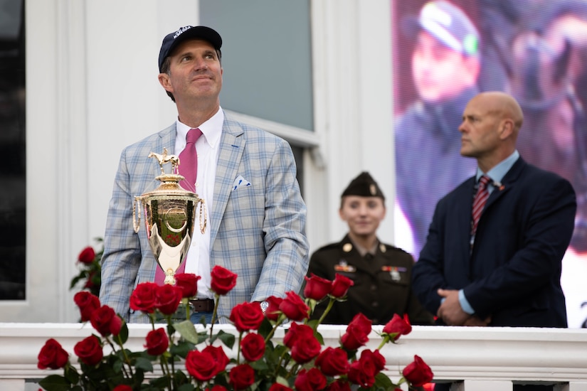 Governor Andy Beshear takes his place at the Pagoda during the 151st running of the Kentucky Derby at Churchill Downs in Louisville, Kentucky, May 3, 2025. The Governor of Kentucky traditionally presents the trophy to the Kentucky Derby winner. (U.S. Army National Guard photo by Sgt. Caleb Sooter)