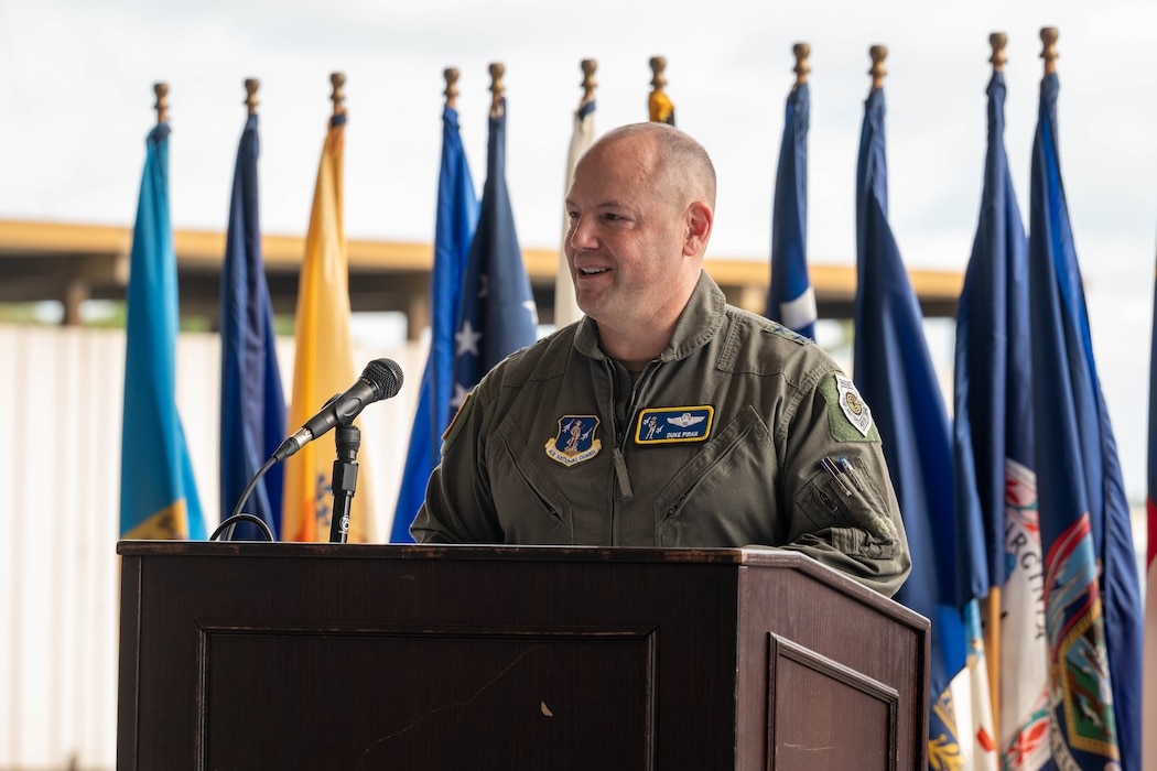 U.S. Air Force Maj. Gen. Duke Pirak speaks to Airmen and civilians prior to a ribbon-cutting ceremony.