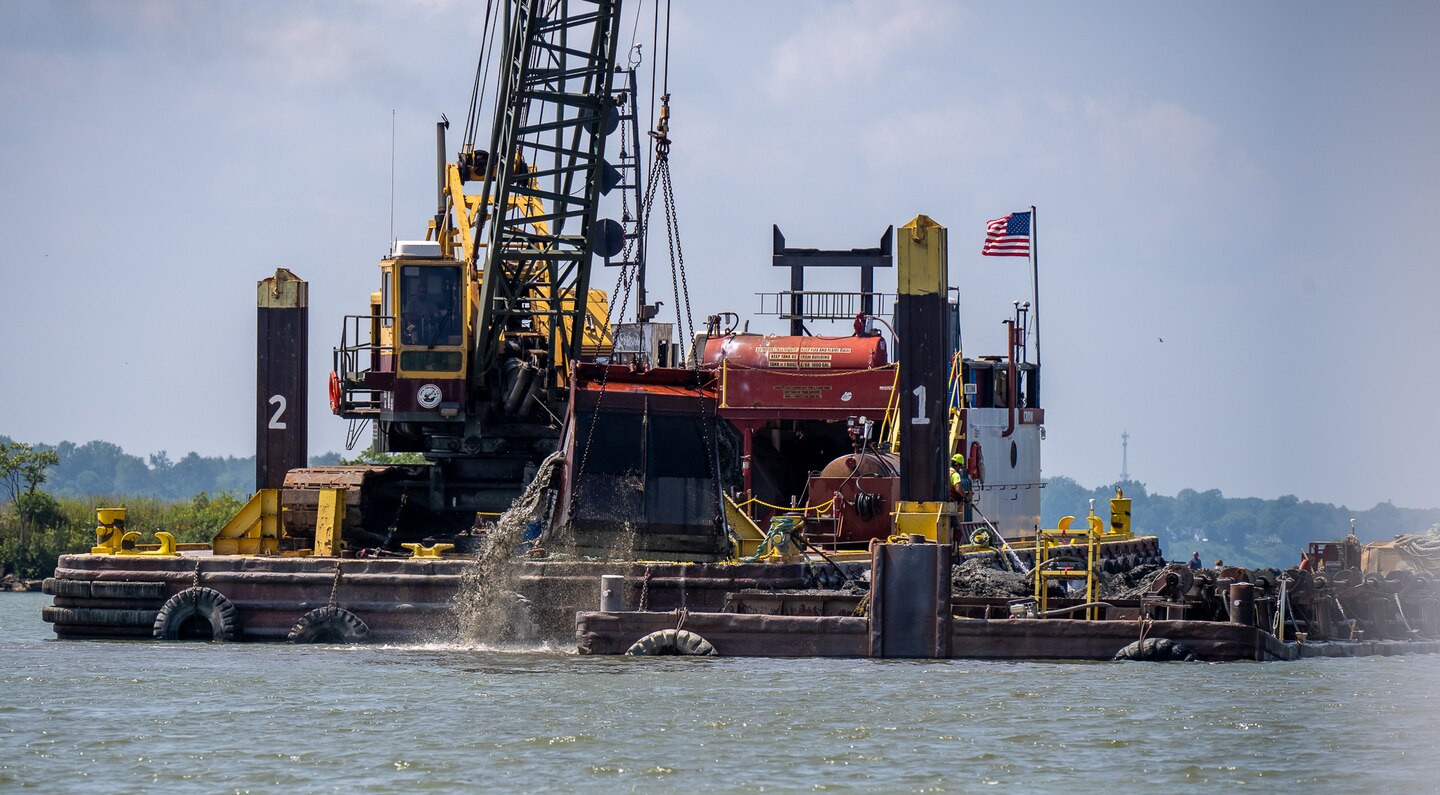 A crane barge conducts dredging in Ashtabula Harbor, Ohio