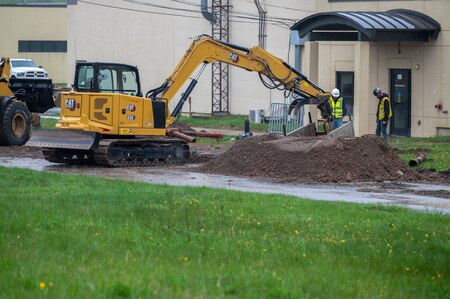 Photo of machine digging lines