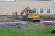 Photo of machine digging in the ground