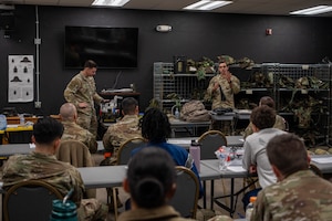Arizona Air National Guard, Tech. Sgt. Peter Zuniga and Arizona Army National Guard Sgt. Darshawn Manhas, 91st Civil Support Team, give a presentation on how to handle hazardous materials detection kits during a CBRN training event at Goldwater Air National Guard Base, Ariz, Jan. 31, 2025. This annual exercise reinforces readiness for emergency response teams across multiple agencies. The 91st CST is a joint Arizona Army and Air National Guard unit that serves the Arizona Department of Emergency and Military Affairs (DEMA) and service members from other military organizations. (U.S. Air Force photo by Staff Sgt. Alexis Orozco)
