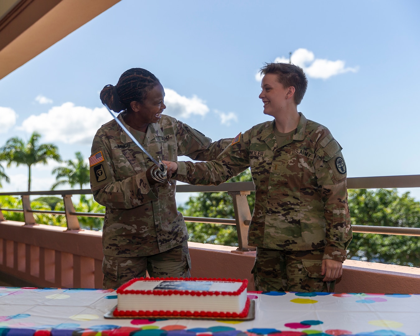 U.S. Army Col. Rosemary Baugh and 2nd Lt. Eliana Swindler pose for a photo during the cake cutting ceremony for the 124th Army Nurse Corp Anniversary held in Tripler Army Medical Center’s Chapel on Feb. 3, 2025. (Defense Health Agency photo by Crizalmer Caraang Jr.)