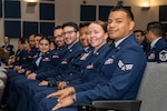 Students are seated during a graduation ceremony from the Inter-American Air Forces Academy at Joint Base San Antonio-Lackland, Texas, April 17, 2025. Approximately 40 Airmen and Guardians graduated from courses in professional military education taught in Spanish by U.S. and Partner Nation instructors. (U.S. Air Force photo by Vanessa R. Adame)