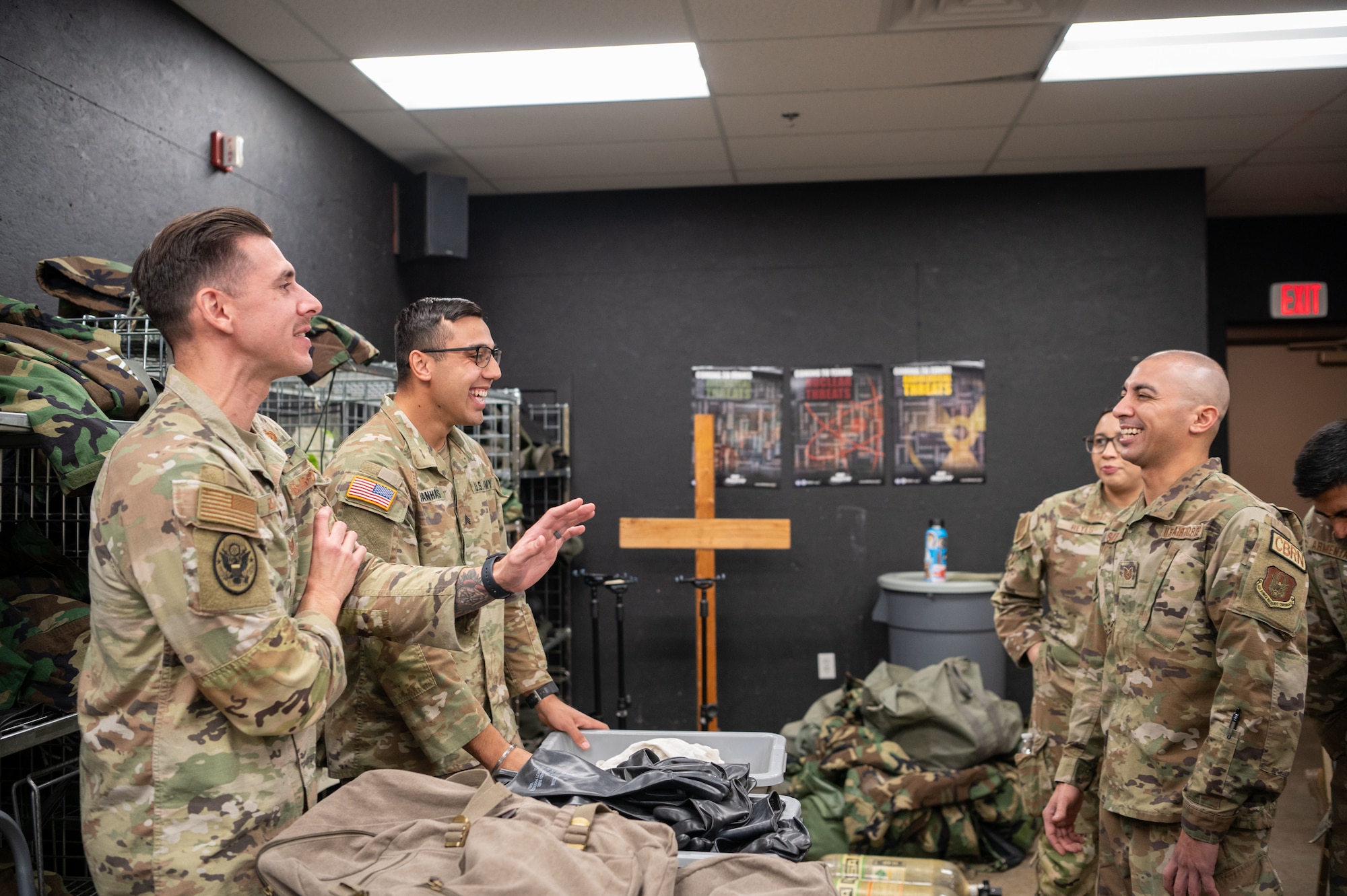 Arizona Air National Guard, Tech. Sgt. Peter Zuniga and Arizona Army National Guard Sgt. Darshawn Manhas, 91st Civil Support Team, engage in classroom instruction, discussing the challenges of hazardous materials response during a joint training exercise at at Goldwater Air National Guard Base, Ariz, Jan. 31, 2025.  The event fosters collaboration among military and civilian emergency responders. The 91st CST is a joint Arizona Army and Air National Guard unit that serves the Arizona Department of Emergency and Military Affairs (DEMA) and service members from other military organizations. (U.S. Air Force photo by Staff Sgt. Alexis Orozco)