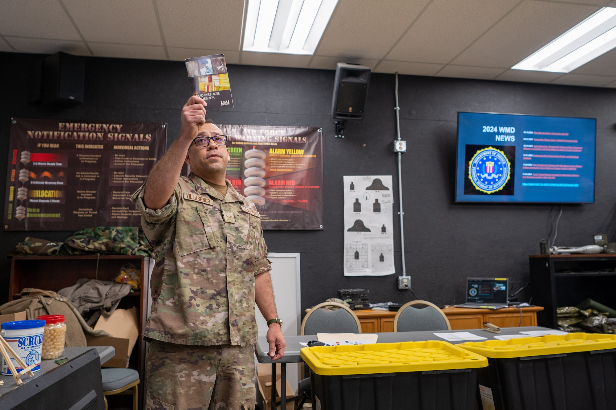 Airman 1st Class Alejandro Villasenor, 61st Air Refueling Wing emergency management specialist, leads a hazardous materials training session about highlighting Weapons of Mass Destruction response protocols, during a joint exercise at Goldwater Air National Guard Base, Ariz, Jan. 31, 2025. This annual training event brings together multiple military and civilian agencies to refine emergency response capabilities and strengthen interoperability. (U.S. Air Force photo by Staff Sgt. Alexis Orozco)