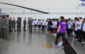 George Washington High School pre-engineering students and Father Duenas Memorial School Junior Reserve Officers’ Training Corps students tour Andersen Air Force Base, Guam, May 2, 2025. HSC-25 members showcased the MH-60S Sea Hawk while explaining day to day life as pilots, rescue swimmers, maintenance and more as part of a base tour. (U.S. Air Force photo by Senior Airman Audree Campbell)