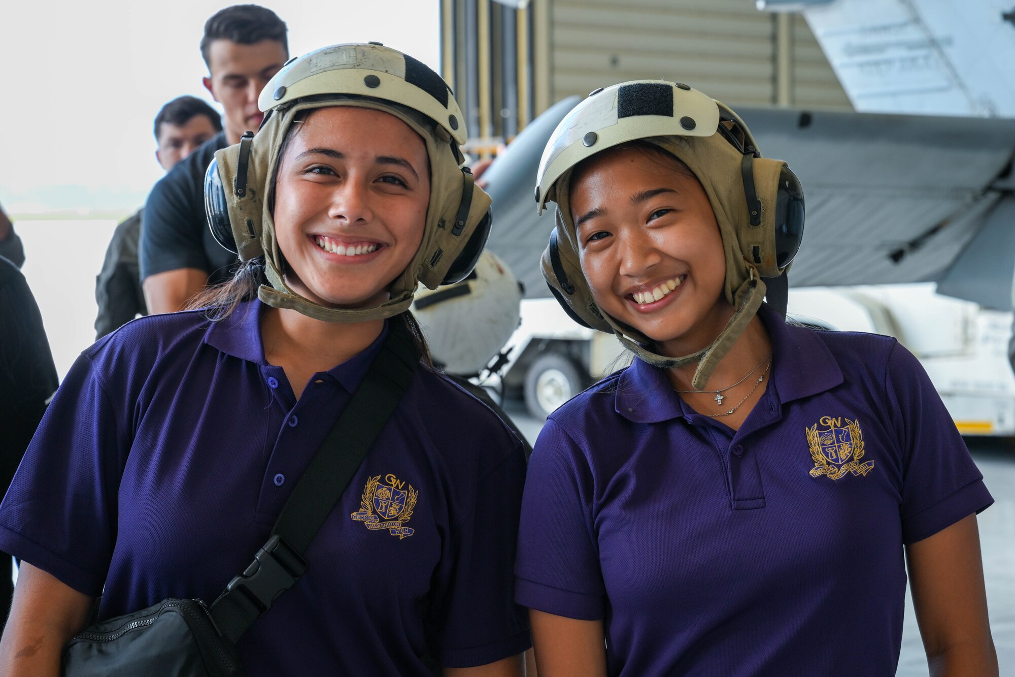 George Washington High School pre-engineering students and Father Duenas Memorial School Junior Reserve Officers’ Training Corps students tour Andersen Air Force Base, Guam, May 2, 2025. HSC-25 members showcased the MH-60S Sea Hawk while explaining day to day life as pilots, rescue swimmers, maintenance and more as part of a base tour. (U.S. Air Force photo by Senior Airman Audree Campbell)