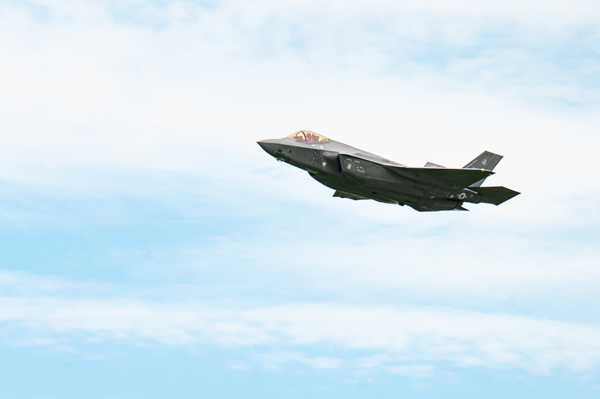 A U.S. Air Force F-35A Lightning II assigned to the 355th Expeditionary Fighter Squadron prepares to land at Marine Corps Air Station Futenma, Japan during a routine 18th Wing readiness exercise at Kadena Air Base, Japan May 6, 2025.