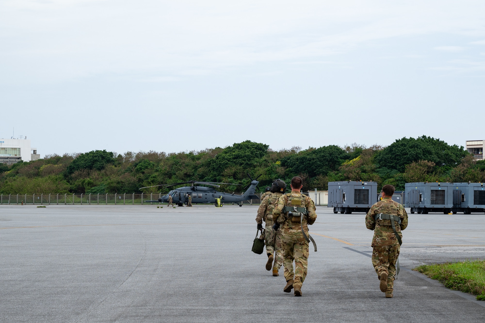 Pilots stepping towards a helicopter