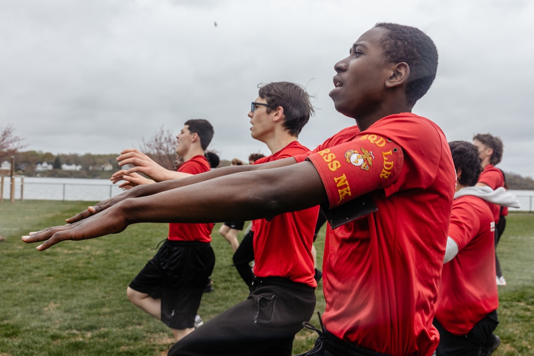 U.S. Marine Corps poolees with Recruiting Station Baltimore, 1st Marine Corps District, participate in a series of physical training exercises during a statewide annual pool function at the United States Naval Academy, Annapolis, Maryland, April 12, 2025. The statewide pool function served as an opportunity for future Marines to build camaraderie and experience firsthand some of the rigors they will face during recruit training. (U.S. Marine Corps photo by Sgt. Jennifer Delacruz)