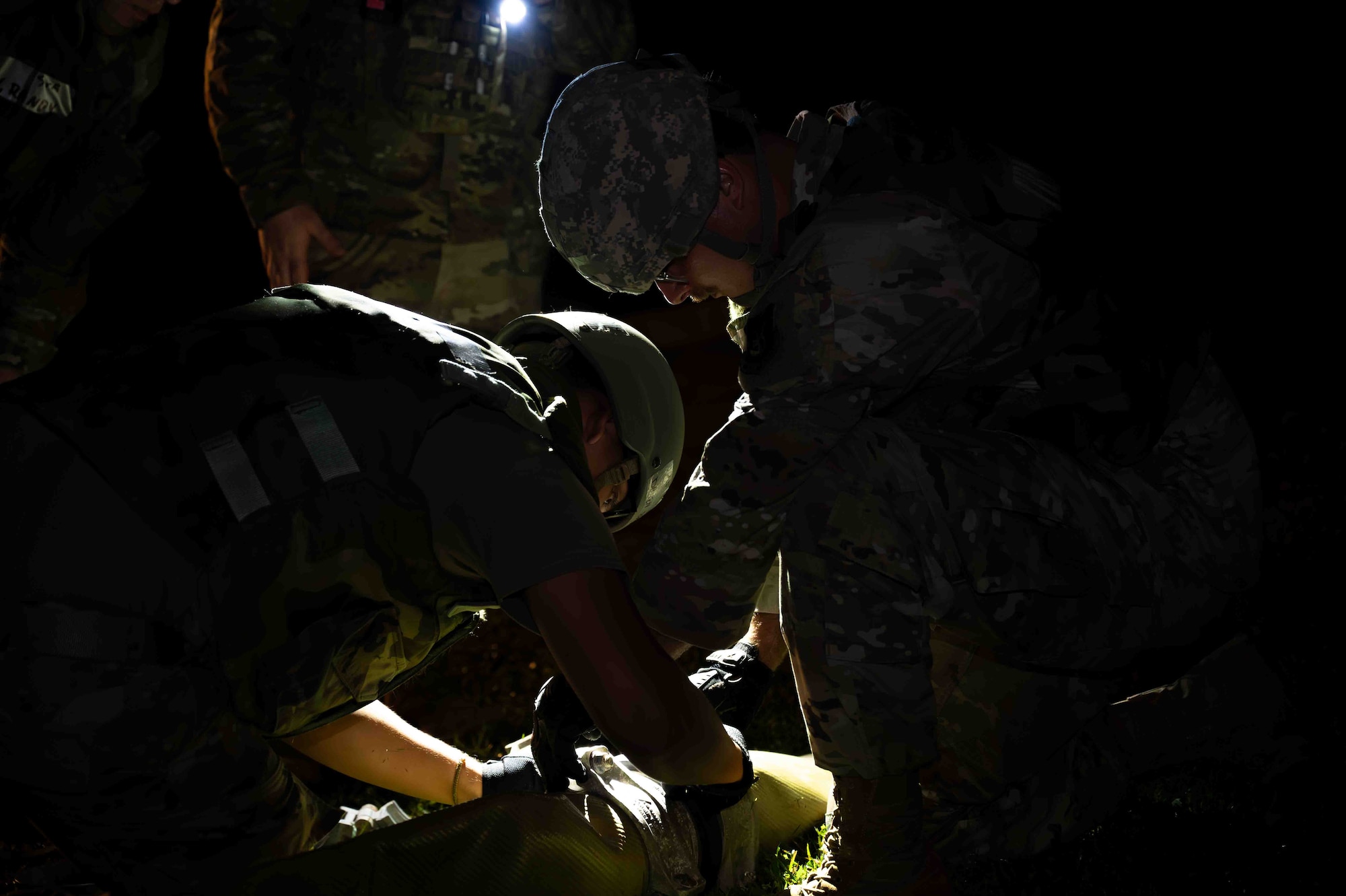 Airmen connects connects hoses.