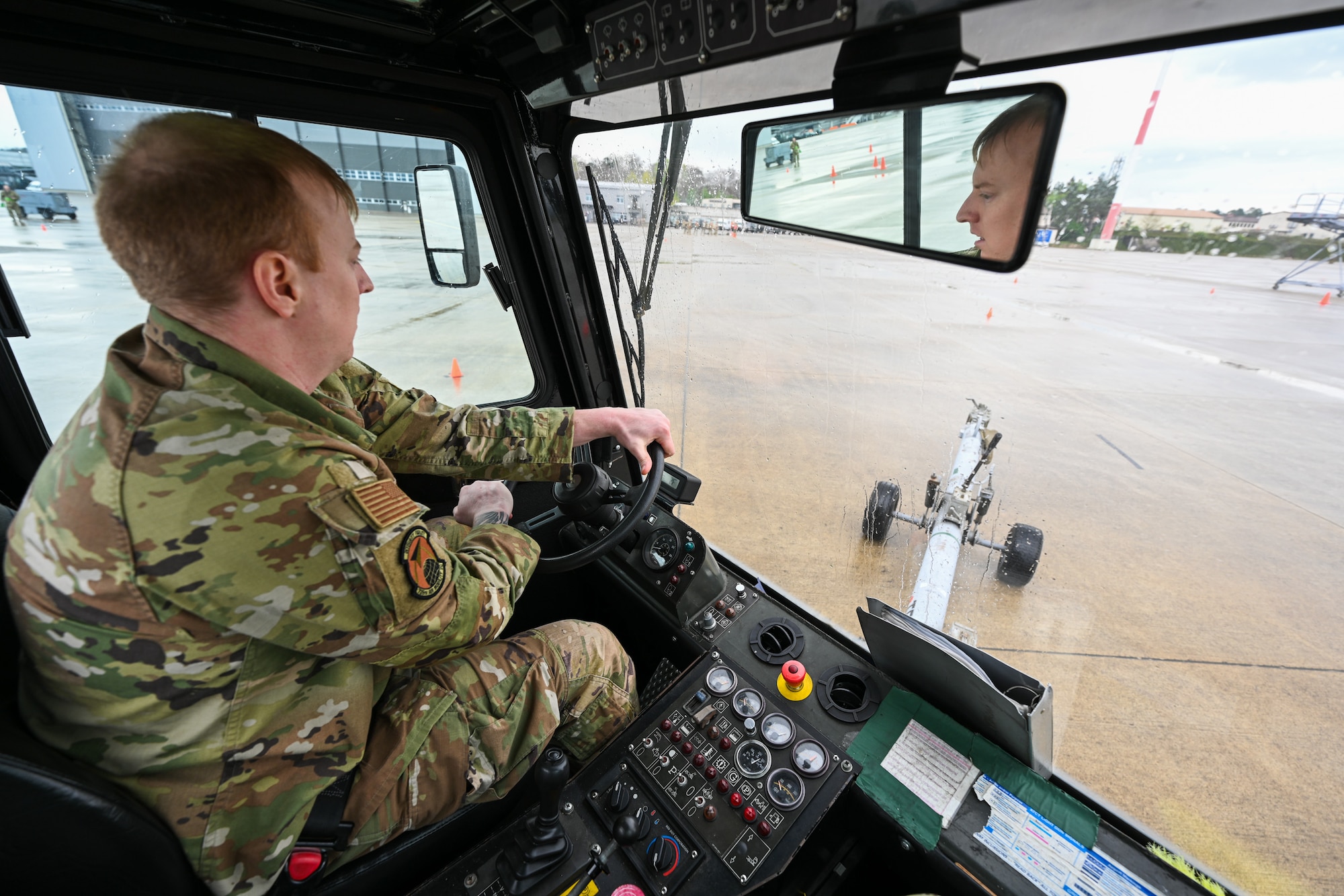 U.S. Air Force Staff Sgt. Joshua Frank, a 726th Air Mobility Squadron aerospace maintenance craftsman, drives a U-30 tow vehicle for the Tow Vehicle Course event during the 521st Air Mobility Operations Wing Mobility Vanguard 2025 at Ramstein Air Base, Germany, May 23, 2025.