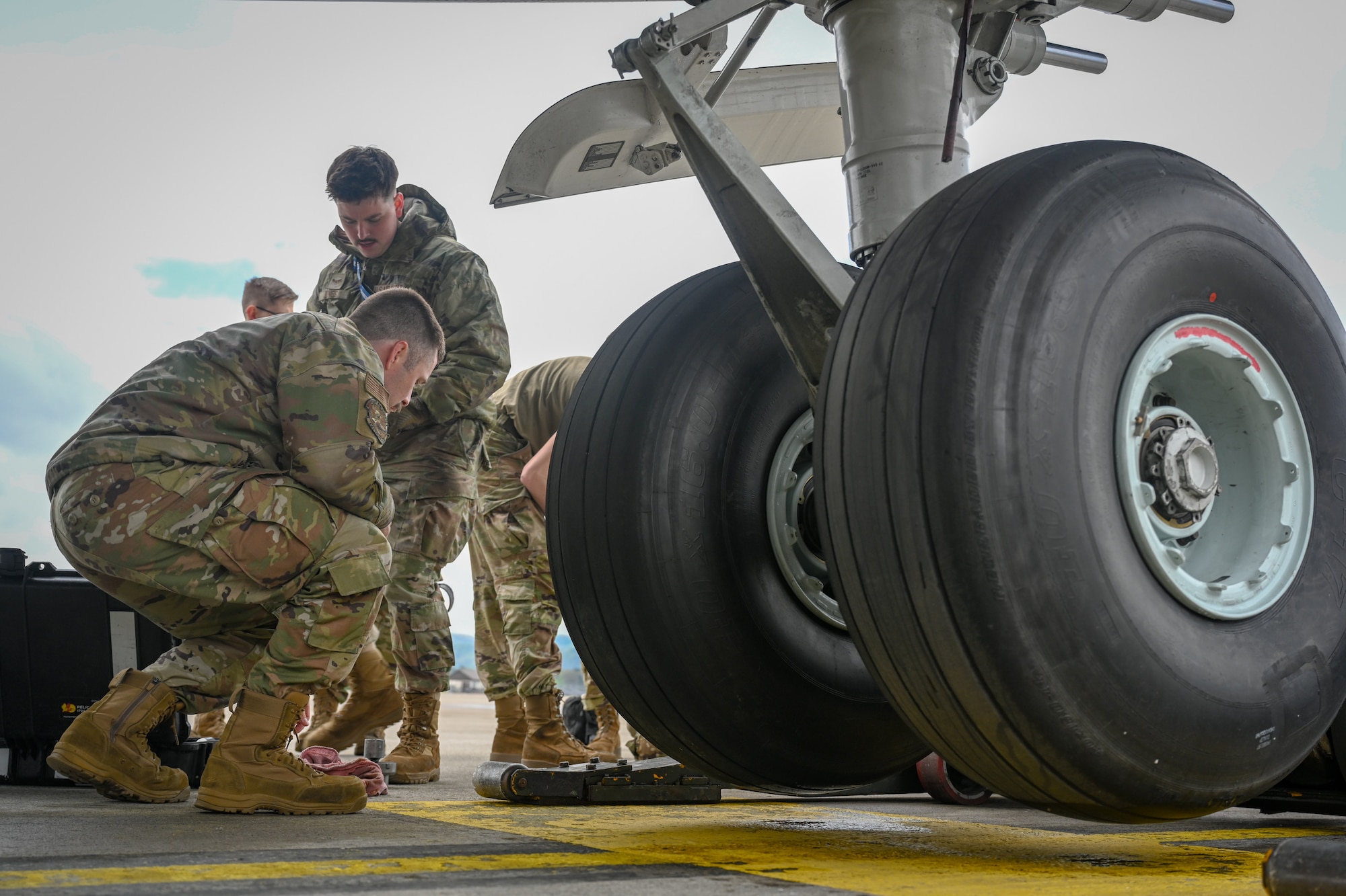 Members from the 860th Aircraft Maintenance Squadron from Travis Air Force Base, Calif., perform during the C-17 Globemaster III Nose Tire Change event during the 521st Air Mobility Operations Wing Mobility Vanguard 2025 at Ramstein Air Base, Germany, May 24, 2025.