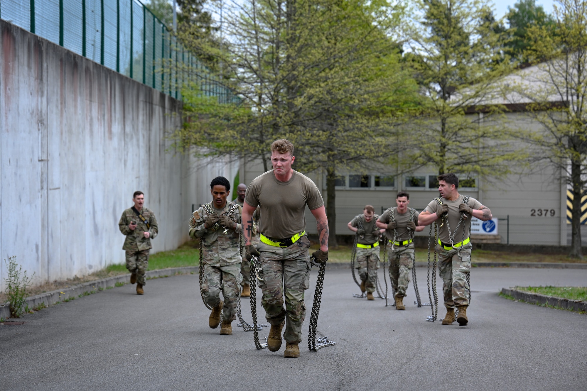 U.S. Air Force members assigned to the 305th Aerial Port Squadron, from Joint Base McGuire-Dix-Lakehurst, New Jersey, participate in the Combat Fitness Challenge during the 521st Air Mobility Operations Wing Mobility Vanguard 2025 at Ramstein Air Base, Germany, May 25, 2025.