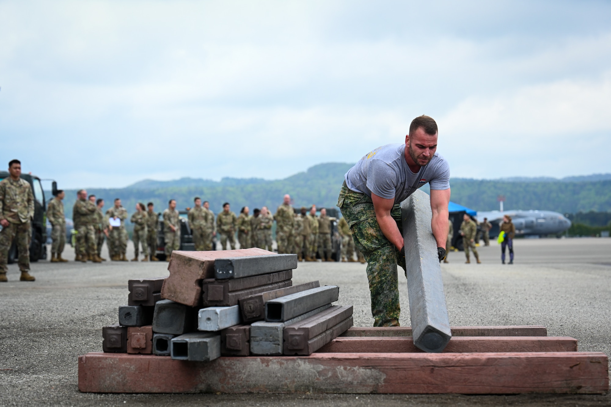 A Royal Netherlands Air Force member assigned to the 940th Squadron, Air Mobility Command, from Eindhoven Air Base, Netherlands, participates in the Combat Fitness Challenge during the 521st Air Mobility Operations Wing Mobility Vanguard 2025 at Ramstein Air Base, Germany, May 25, 2025.