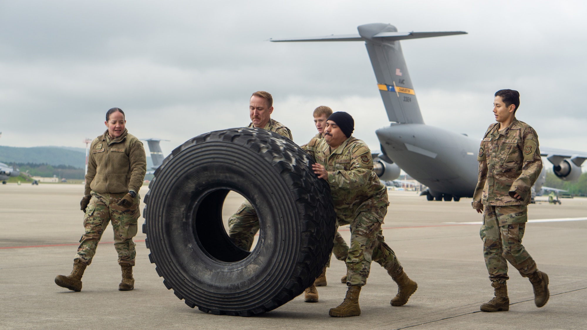 Members assigned to the 436th Aircraft Maintenance Squadron from Dover Air Force Base, Delaware, participate in the Combat Fitness Challenge during the 521st Air Mobility Operations Wing Mobility Vanguard 2025 at Ramstein Air Base, Germany, May 25, 2025.