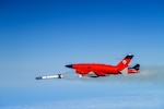A BQM-34 unmanned aerial target, which is remotely piloted during flight, releases a test missile over the Point Mugu Sea Range. The test advanced a missile design aimed at improving range and targeting for future Navy missions.